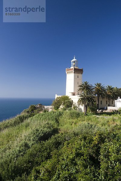 sitzend Eingang Mütze Wahrzeichen Leuchtturm Afrika Mittelmeer Marokko