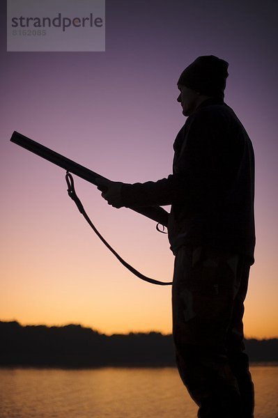 Silhouette  halten  See  Jagd  Abenddämmerung