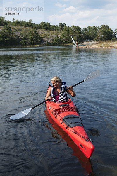 Woman kayaking