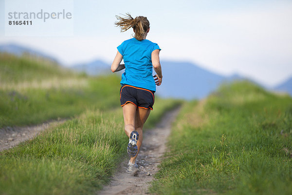 Frau  Rückansicht  joggen  Ansicht  jung