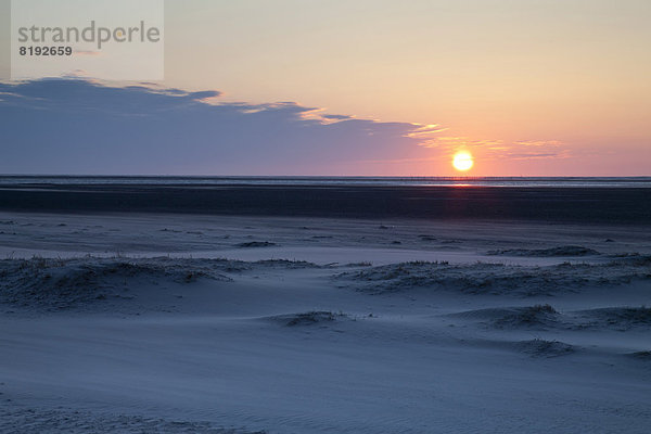 Sonnenuntergang über den Sanddünen am Nordstrand