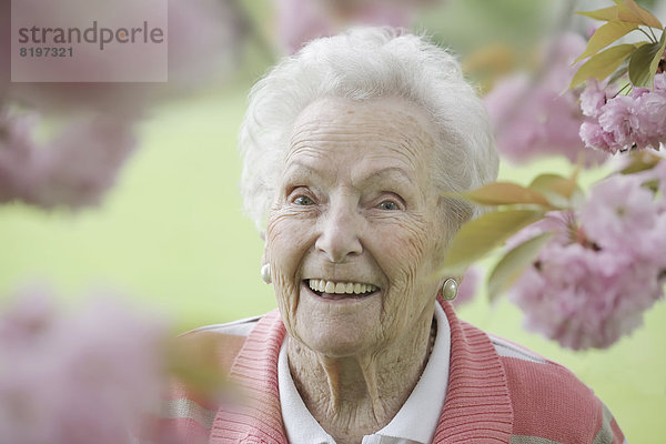 Portrait of senior woman smiling  close up