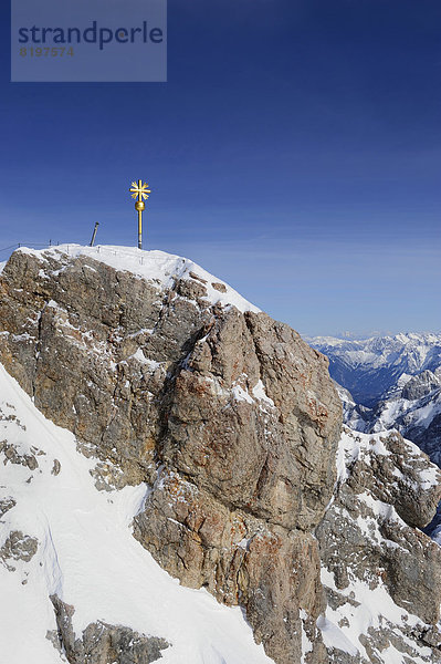 Germany  Bavaria  View of summit cross at Zugspitze Mountain