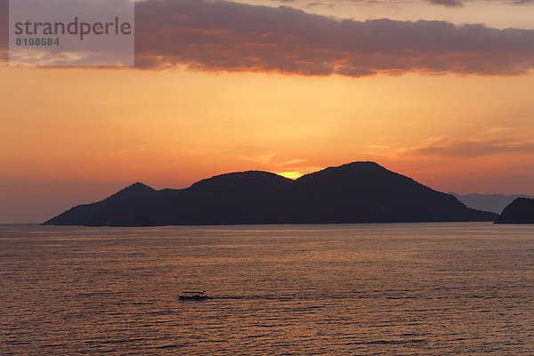 Turkey  Mugla  Fethiye  Island at sunset at Lycian coast