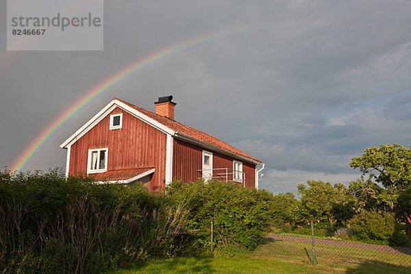 Tradition über Blockhaus Regenbogen Holzhaus