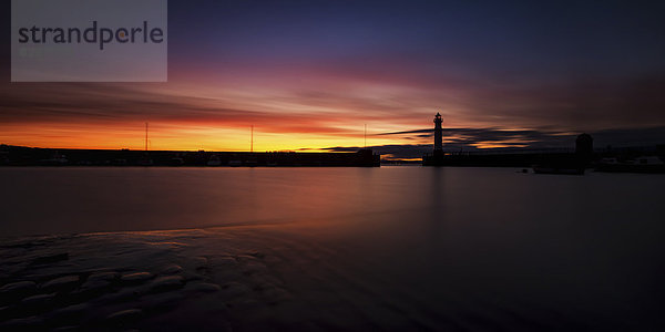 UK  Scotland  Edinburgh  Newhaven Harbour with lighthouse at sunset