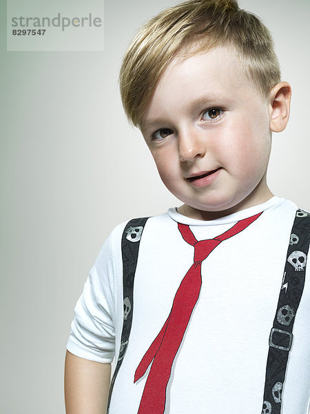 Portrait of smiling little boy  studio shot