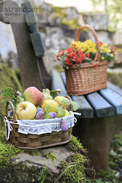 Germany  Bavaria  baskets with fresh fruits and flowers