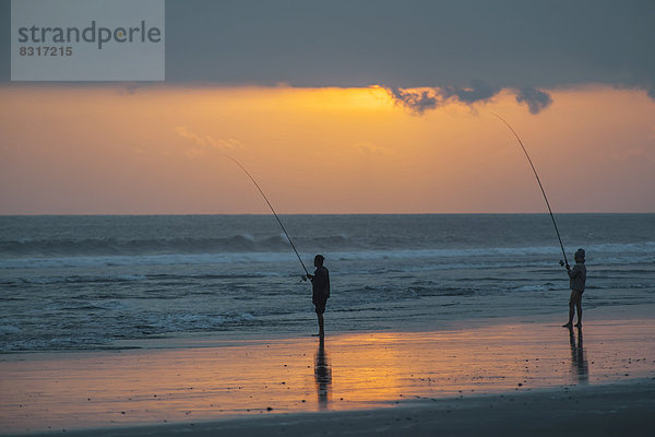 Fischer am Strand