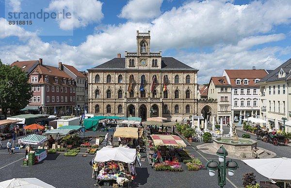 Market square with weekly market  Town Hall at back