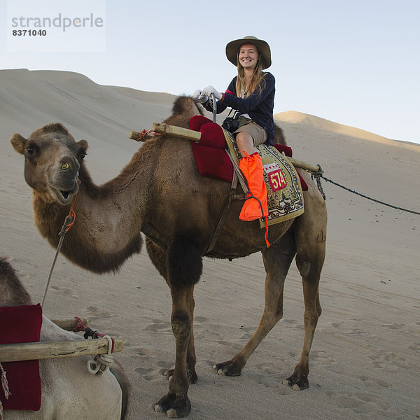 fahren  China  Mädchen  Kamel