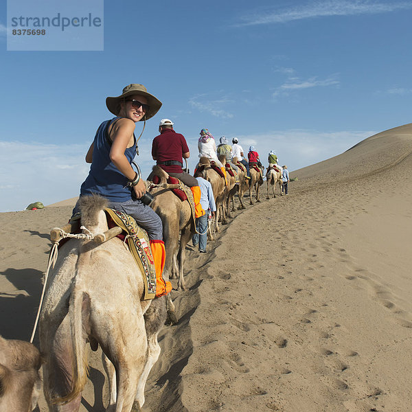 fahren Tourist China Kamel mitfahren