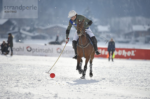 Polospieler vom Team Parmigiani  Polo on Snow  Poloturnier  11. Valartis Bank Snow Polo World Cup 2013  Kitzbühel  Tirol  Österreich