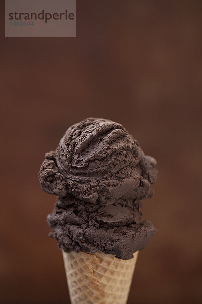 kegelförmig  Kegel  hoch  oben  nahe  Eis  Schokolade  Sahne