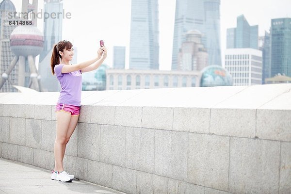 Junge Frau fotografiert in Shanghai  China