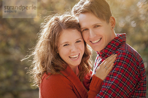 Portrait of happy young couple  close-up