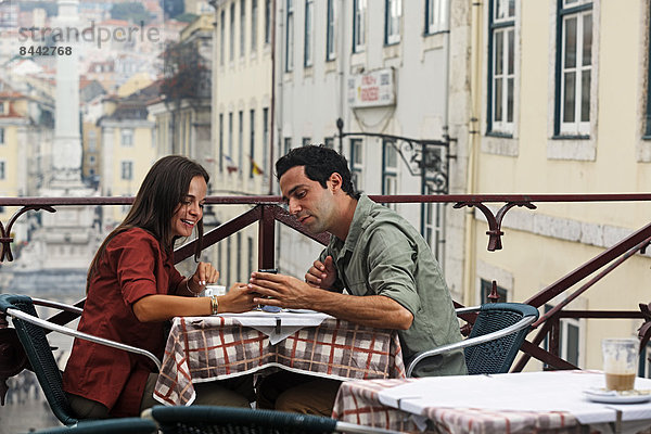 Portugal  Lisboa  Carmo  Largo du Duque  young couple sitting at street cafe