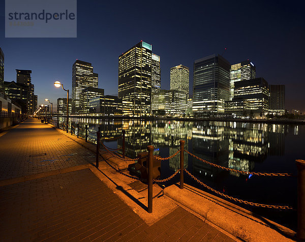 UK  London  Docklands  illuminated buildings at financial district