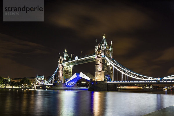UK  London  view to illuminated Tower Bridge at night