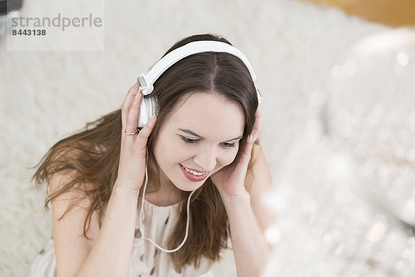 Young woman wearing headphones