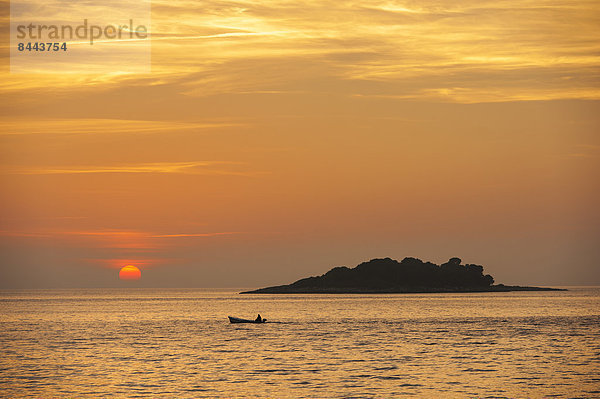 Croatia  Vrsar  Sunset over sea with boat