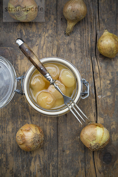 Pickled onions in preserving jar