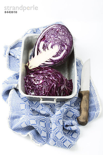Red cabbage  kitchen knife and kitchen towel