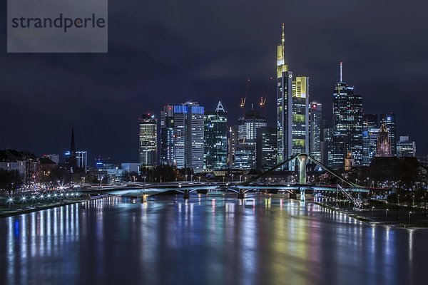 Germany  Hesse  Frankfurt am Main  financial district  Ignatz-Bubis-Bridge  skyline at night