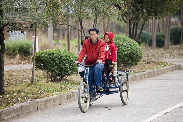 1  verringern  Bevölkerungsgruppe  China  Guilin  Planung  Dreirad