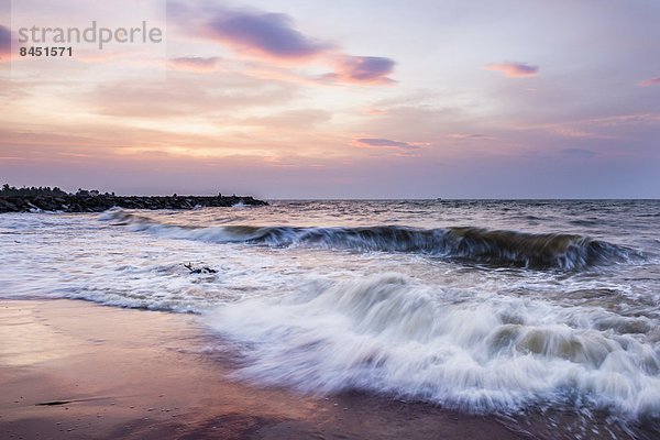 Strand Sonnenuntergang Asien Wellen brechen