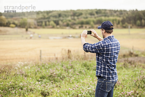 Rückansicht des Farmer-Fotofeldes per Handy