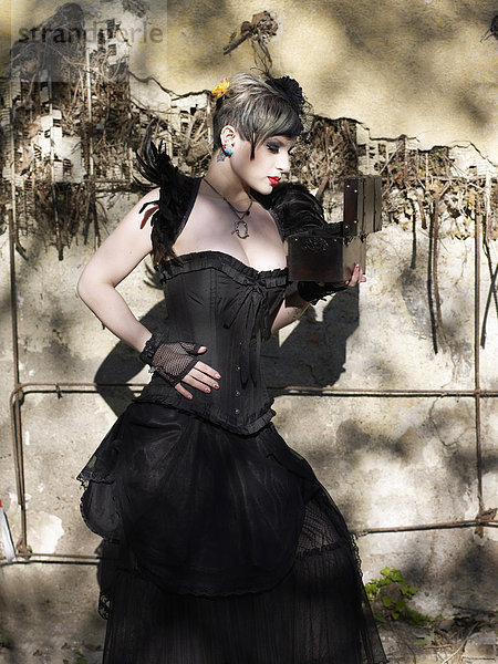 Young woman wearing Steampunk clothing  ßictorian style