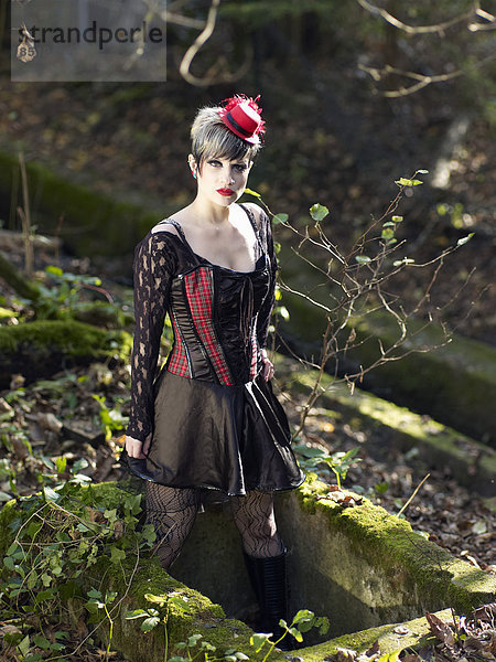 Young woman wearing Steampunk clothing  ßictorian style