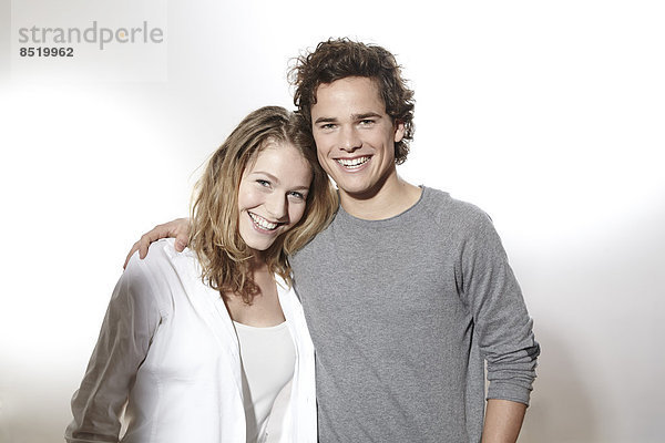 Portrait of happy young couple  studio shot