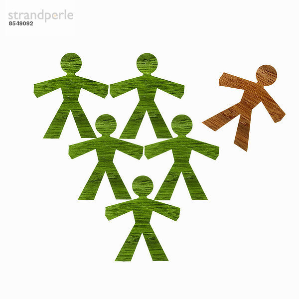 Scherenschnitte  ausgeschnittene Figuren  die Menschen darstellen. Fünf grüne und eine braune Figur.