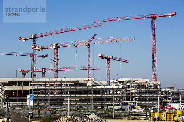 Baukräne auf einer Großbaustelle  Neubau der Hochschule Ruhr-West  Mülheim an der Ruhr  Nordrhein-Westfalen  Deutschland