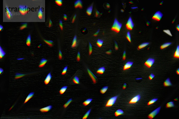Abstraktes Hintergrundbild aus Regenbogenlichtern