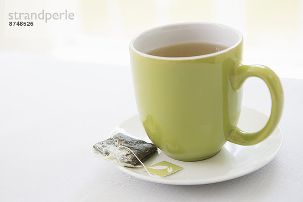 Studioaufnahme  gebraucht  Tasse  Becher  Tasche  grün  Espressotasse  Untertasse  Tee