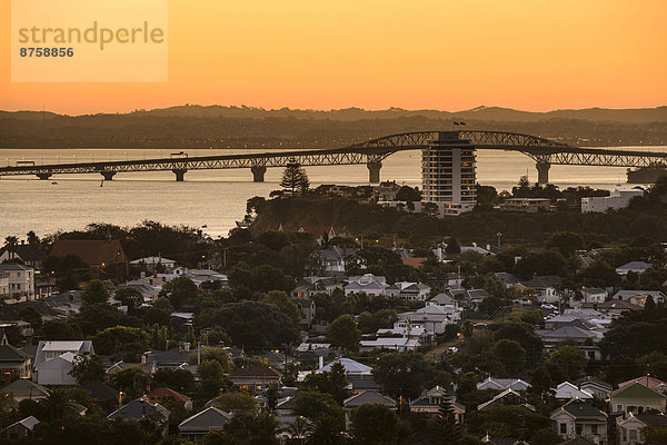 afterglow architecture Auckland Auckland Harbour Bridge Auckland Region buildings city cityscape coast coastal city evening atmosphere high-angle shot mood New Zealand nobody North Island ocean outdoors travel photography urban view