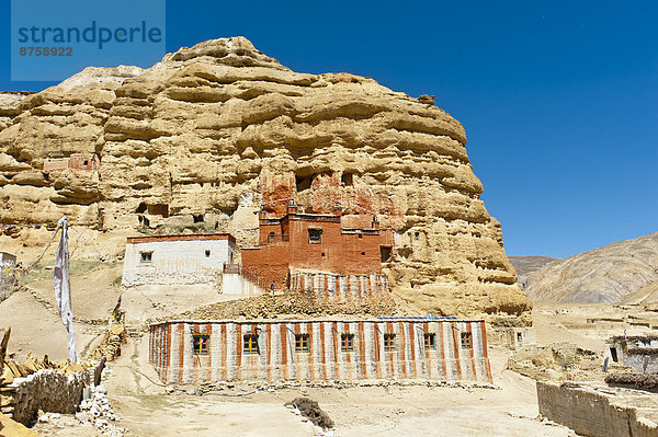 architecture Buddhism Buddhist building Chhoser daytime monastery Nepal nobody Nyphu Gompa outdoors religion religious Tibetan travel photography Upper Mustang