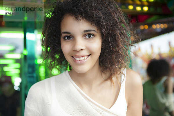Young woman at fairground  portrait