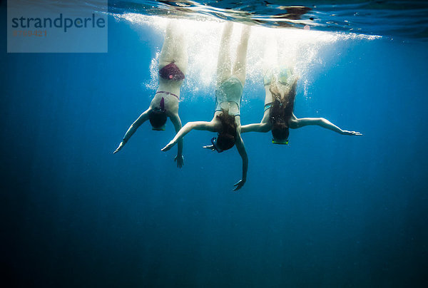 Croatia  Brac  Sumartin  Three girls under water