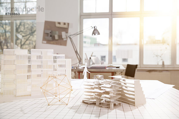 Desktop with architectural model in architecture office