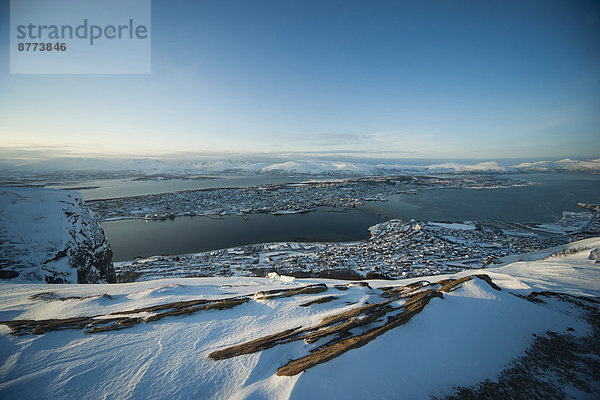 Norway  Troms  Tromso  View from Storsteinen  Cityscape  Tromso Bridge in winter