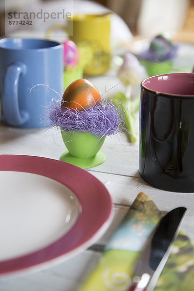 Festive laid breakfast table with Easter egg