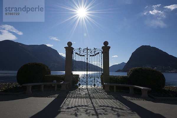 Gegenlicht  Sonnenstrahl  Europa  Berg  See  Eingang  Lugano  Schweiz