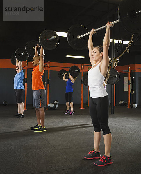 Fitness-Studio  Mensch  Menschen  heben  Hantel