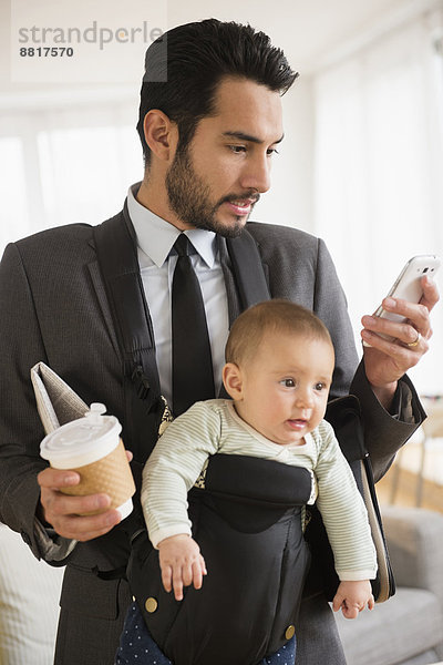 Geschäftsmann  tragen  Telefon  Handy  Baby