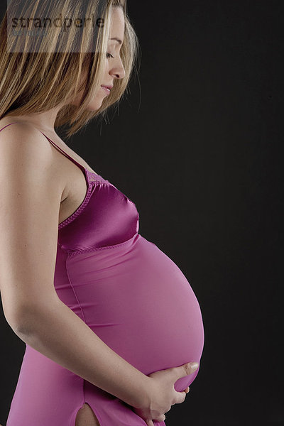 Europäer  Frau  halten  Schwangerschaft