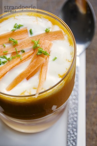 Carrot and orange soup with soy yoghurt
